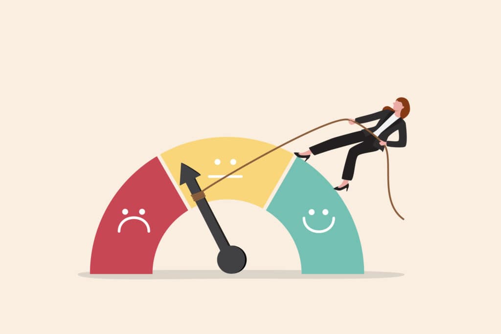 A woman standing on a satisfaction meter pulling a rope attached to the arrow.