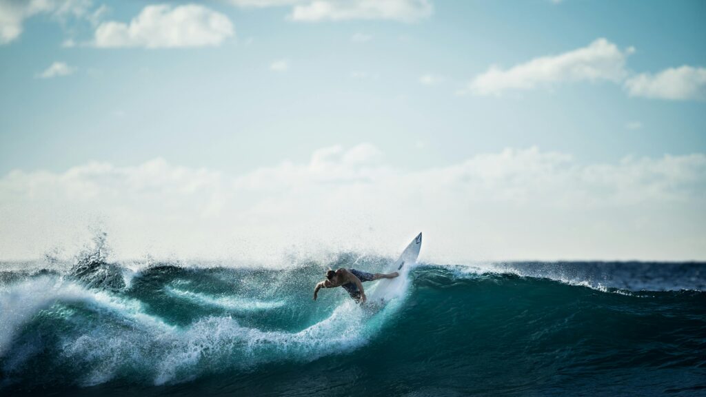Surfer riding a wave.